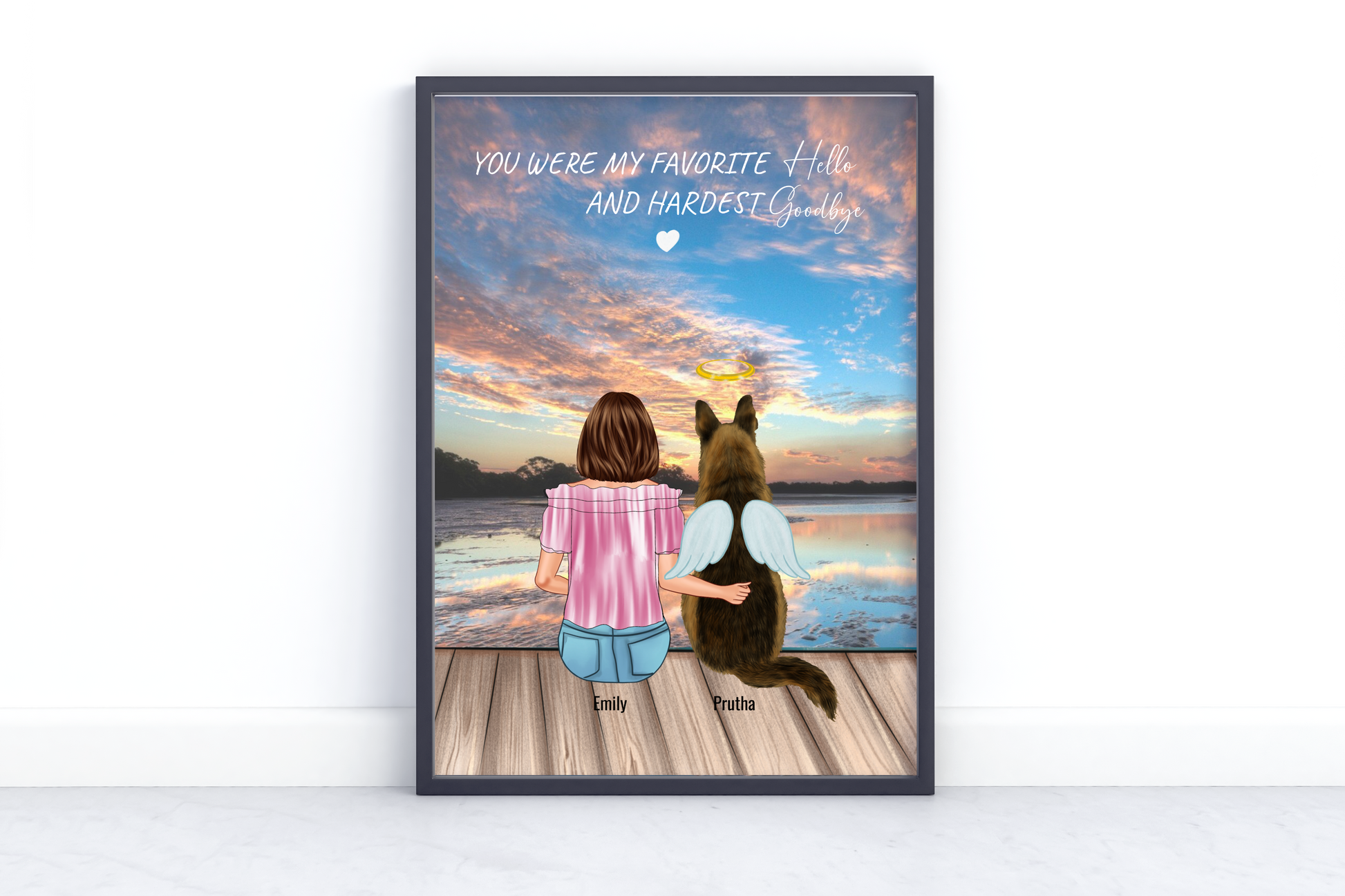 A girl with short brown hair sits on a wooden deck beside her angel dog with wings and halo, watching a sunset over a calm lake. Text reads “You were my favorite hello and hardest goodbye.” Personalized with names Emily and Prutha.